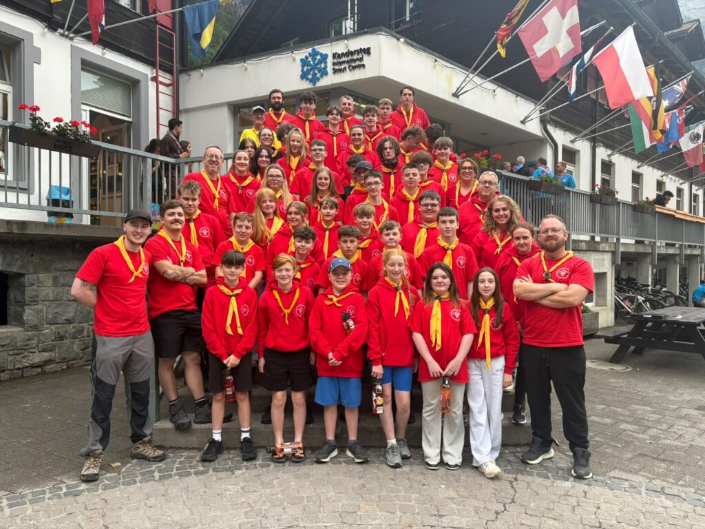 1st Monkstown Scout Group gathered outside the Kandersteg International Scout Centre.